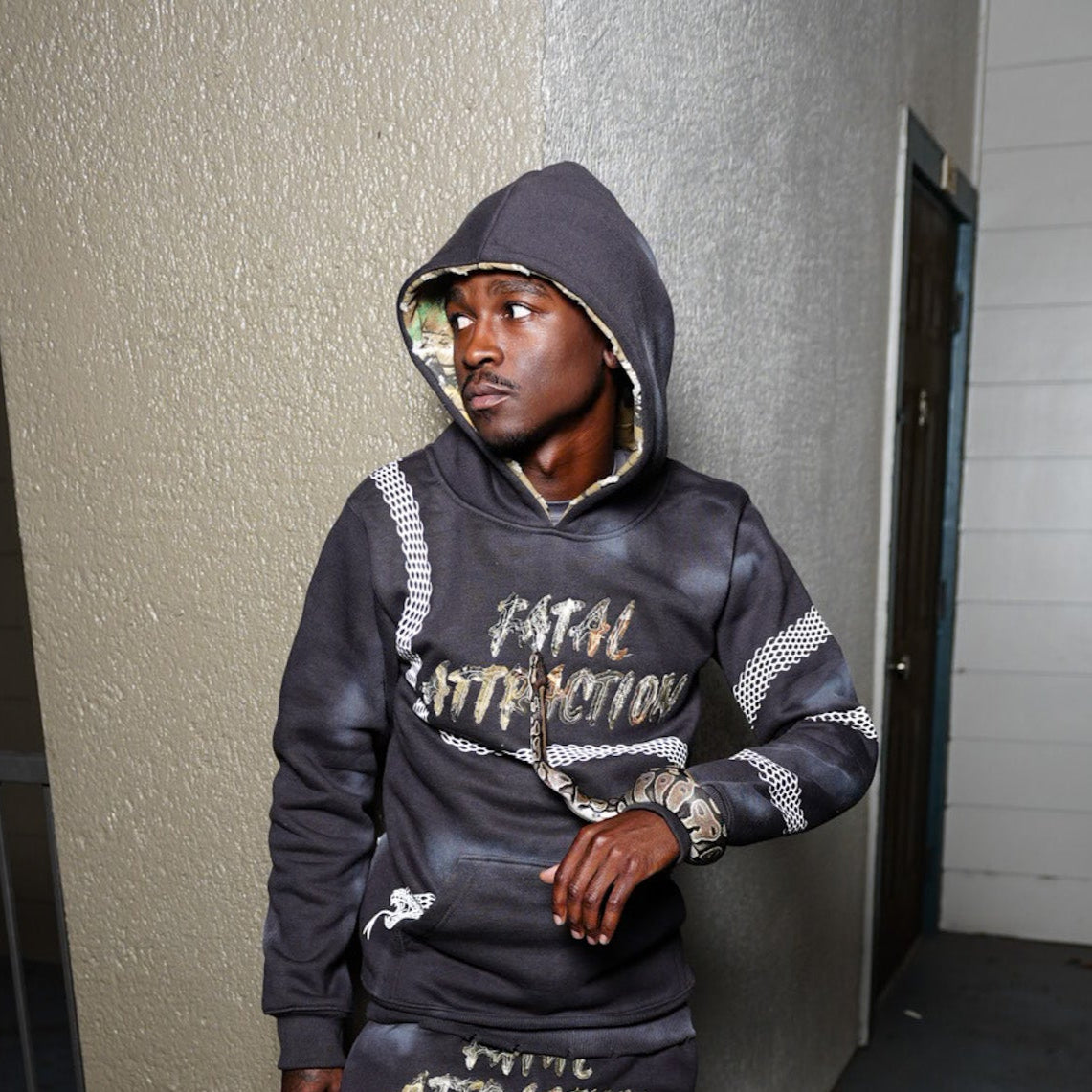 Hugged By Snakes Hoodies